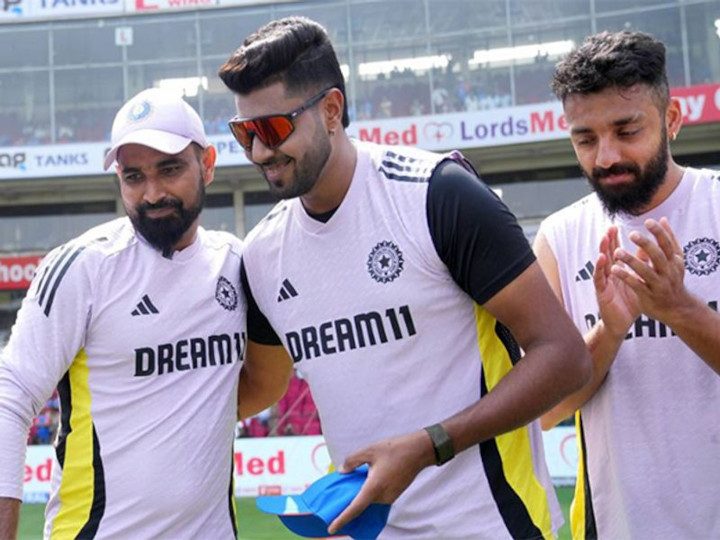 Harshit Rana with other cricket players on the field